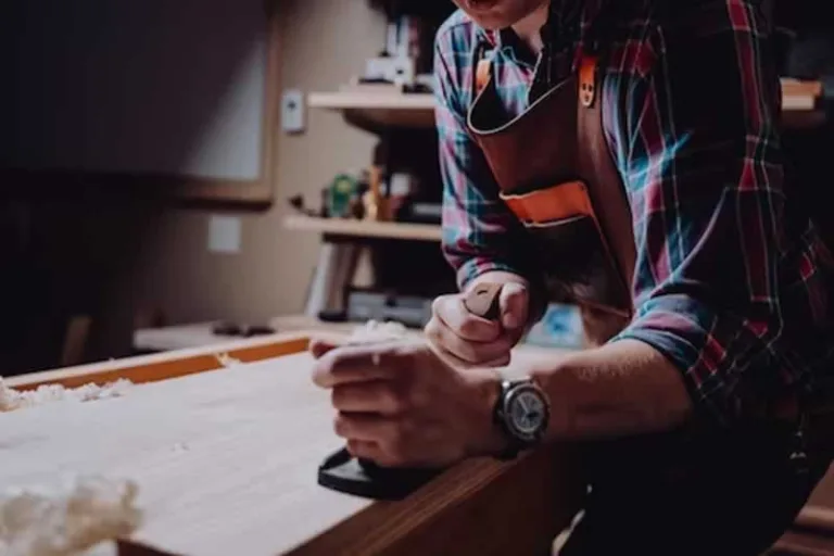 man working with plane