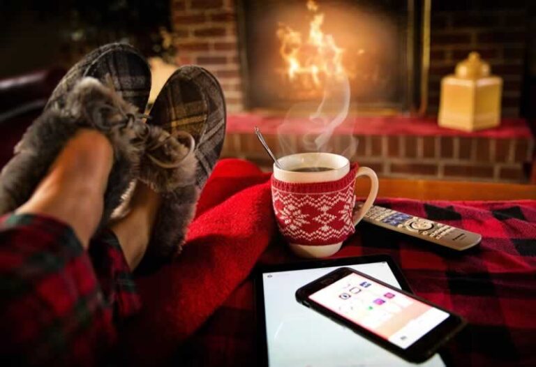 sitting by the fireplace