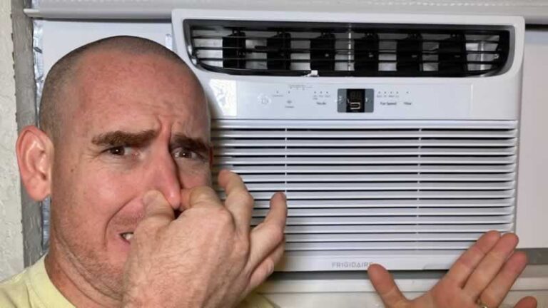man in front of smelly AC
