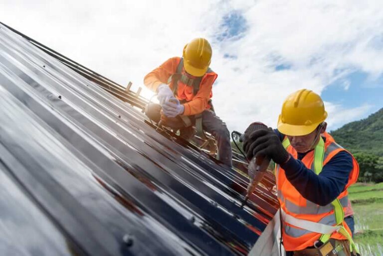 roofers installing roof