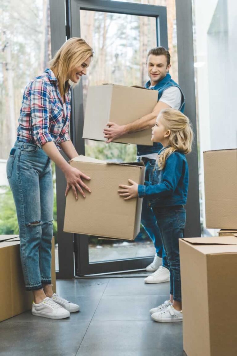 kids carrying moving boxes