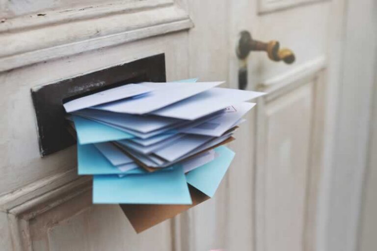 pile of mail in the mailbox