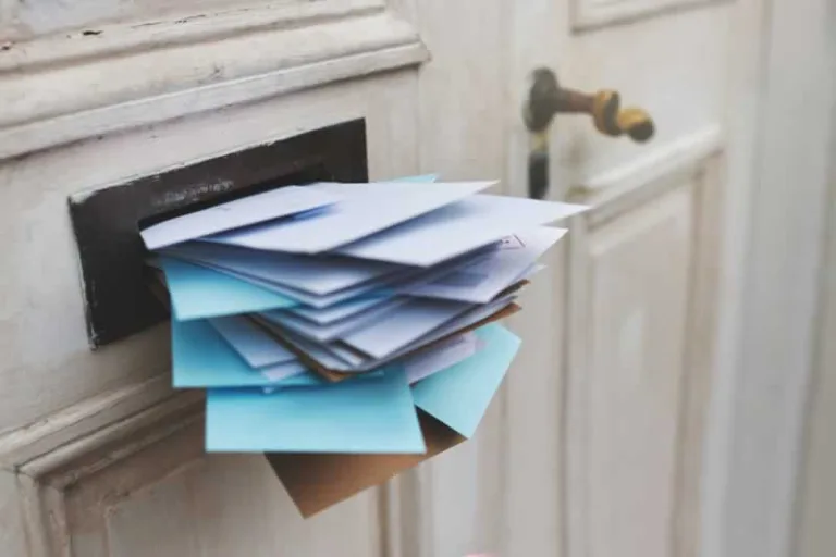 pile of mail in the mailbox