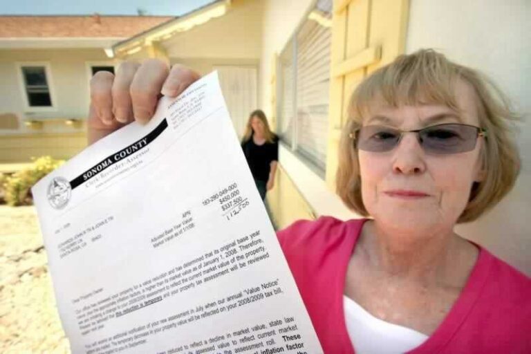 woman holding tax notice