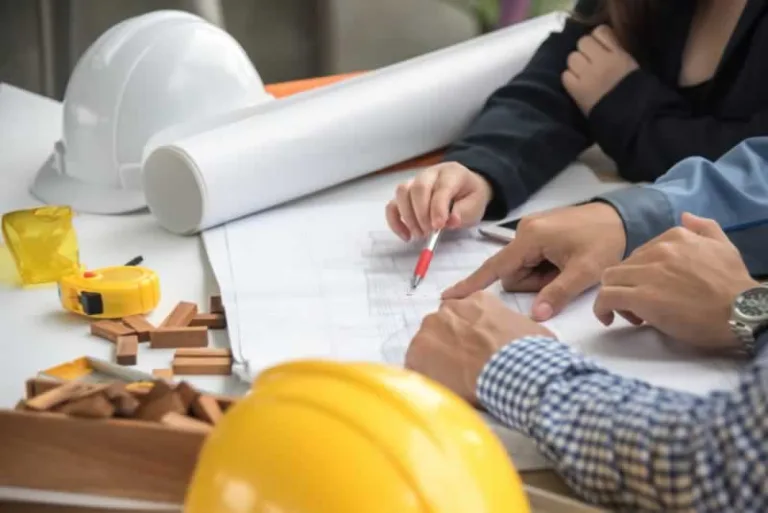 engineer working on plans