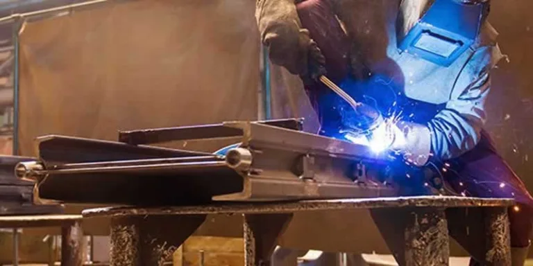 man welding