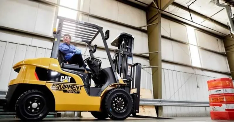 men operating a forklift