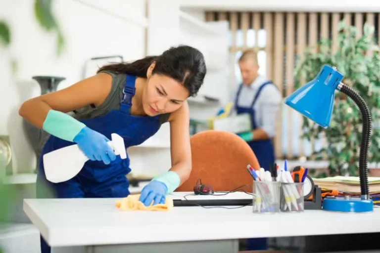 women cleaning office