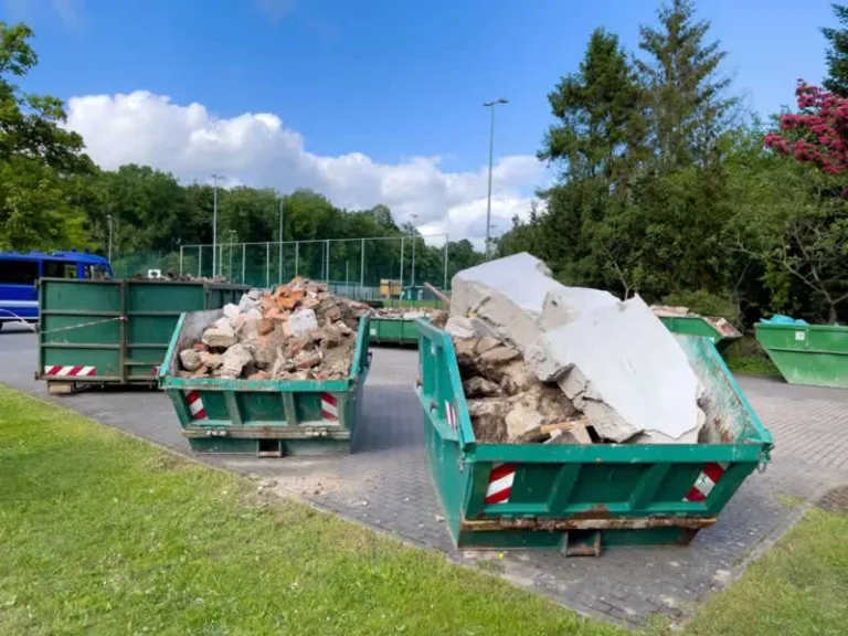 dumpsters filled with renovation waste