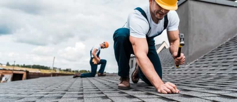 roofer fixing shingles