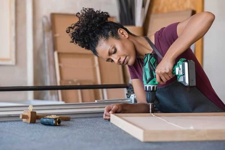 woman drilling wood