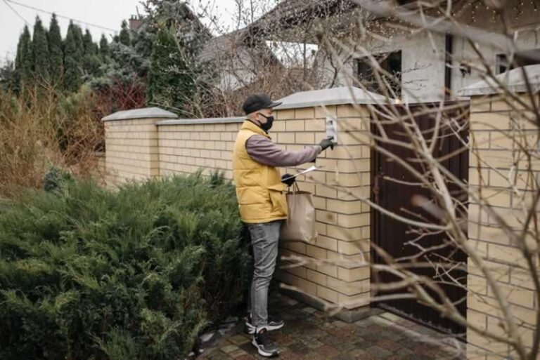 delivery man at the doorbell