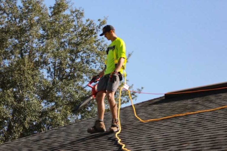 roofer washing the roof