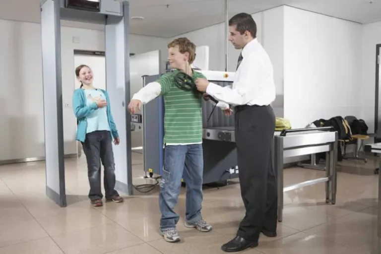kids trying out metal detectors