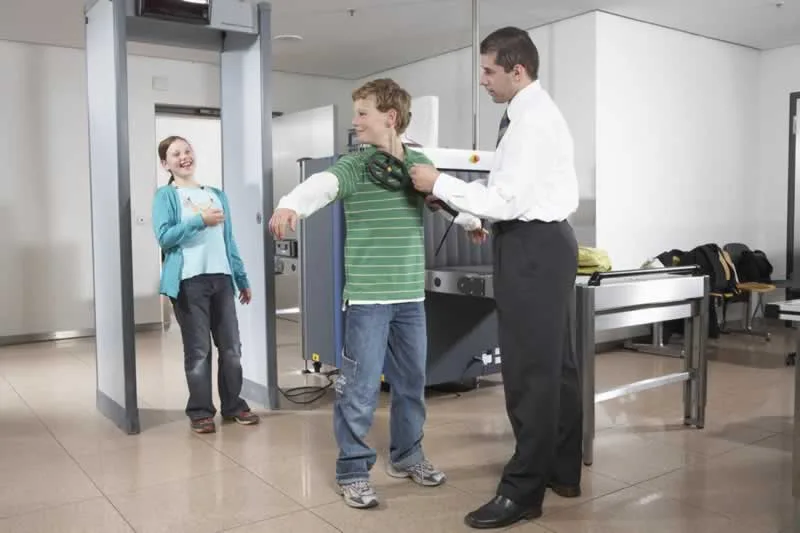 kids trying out metal detectors