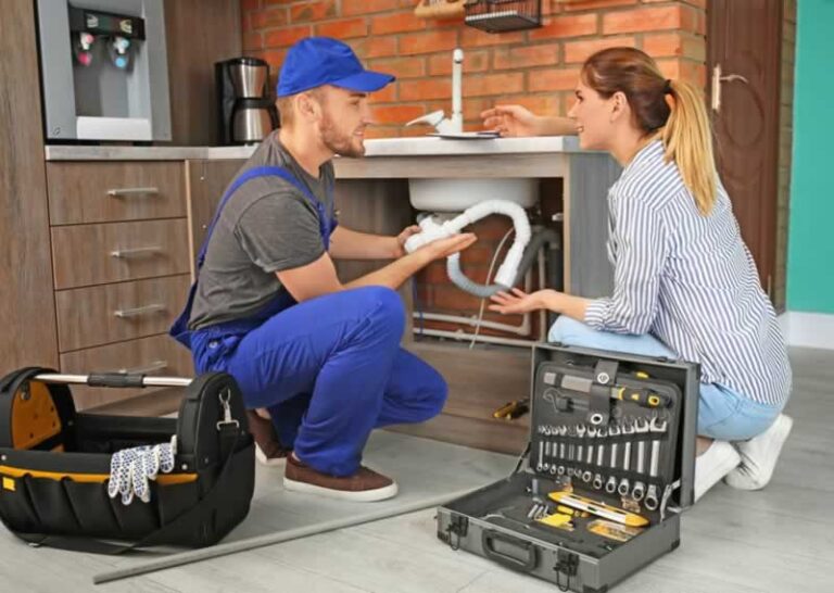 plumber with female homeowner