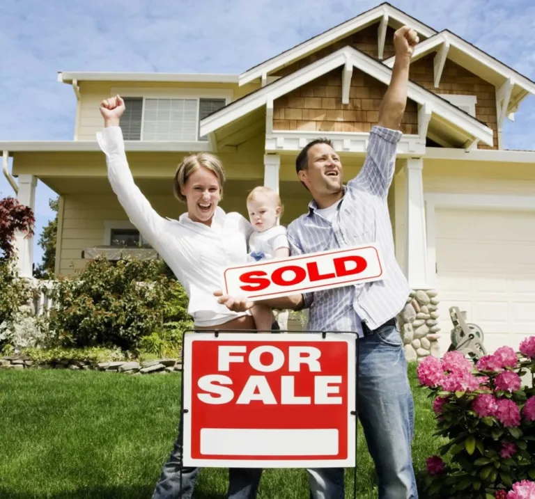 family celebrating for selling home