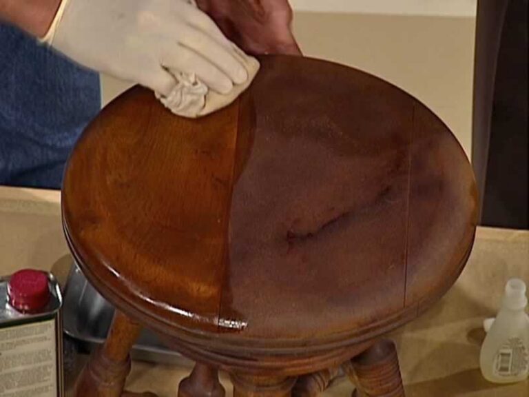 polishing wooden chair with essential oil