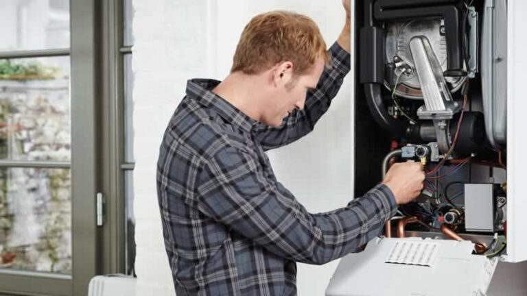technician doing regular boiler service