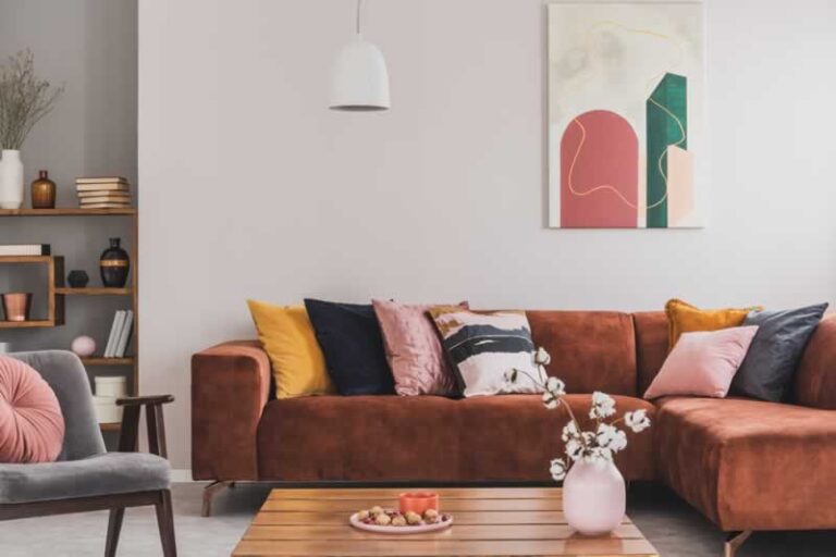colorful cushions on corner sofa