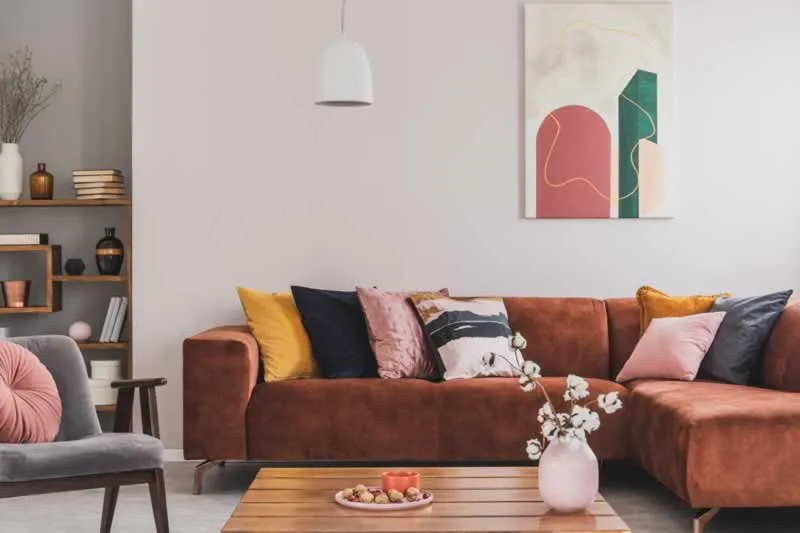 colorful cushions on corner sofa
