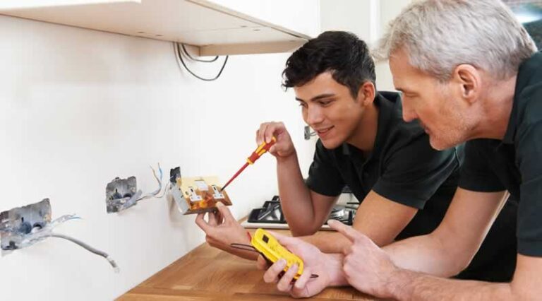 electricians installing power outlets