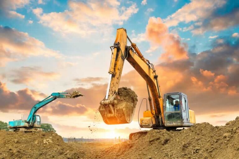 big excavators excavating dirt