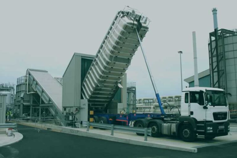 truck unloading material in bulk handling system