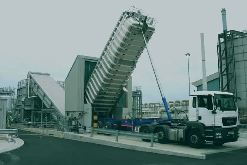 truck unloading material in bulk handling system