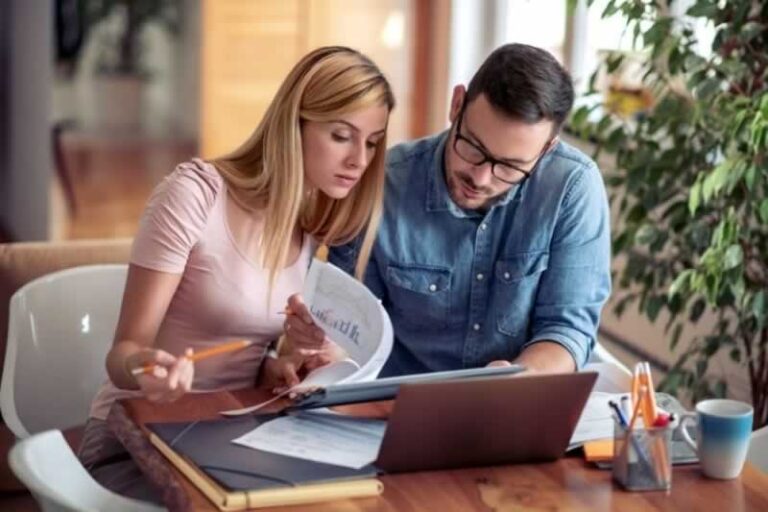 couple looking at bills