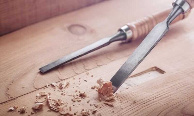 carving wood with chisel