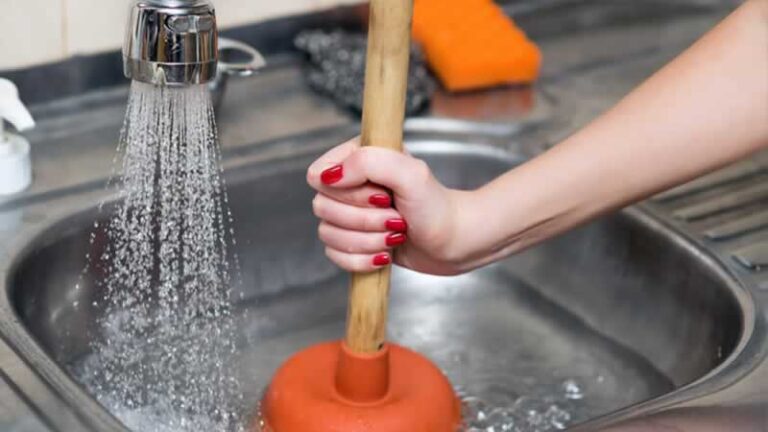 cleaning drain with plunger