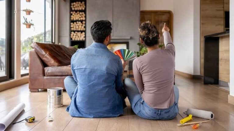 couple checking home improvement ideas