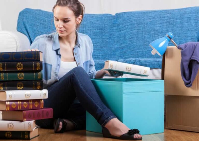 student packing books