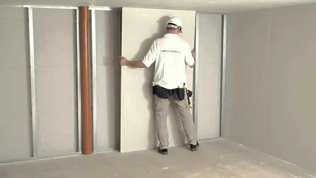man doing drywall lining