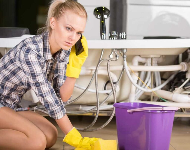 woman in plumbing emergency