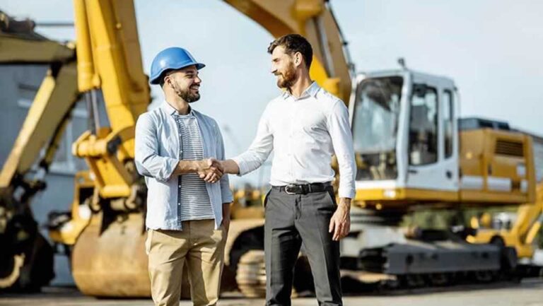 businessman buying used construction equipment