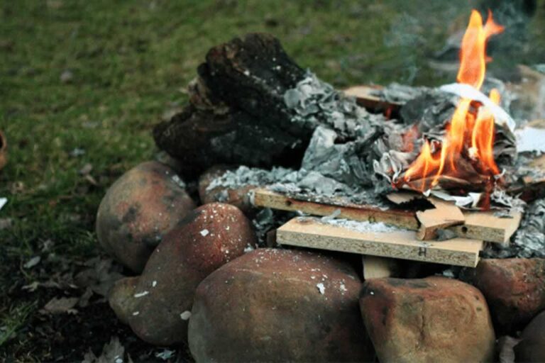 burning painted wood outside