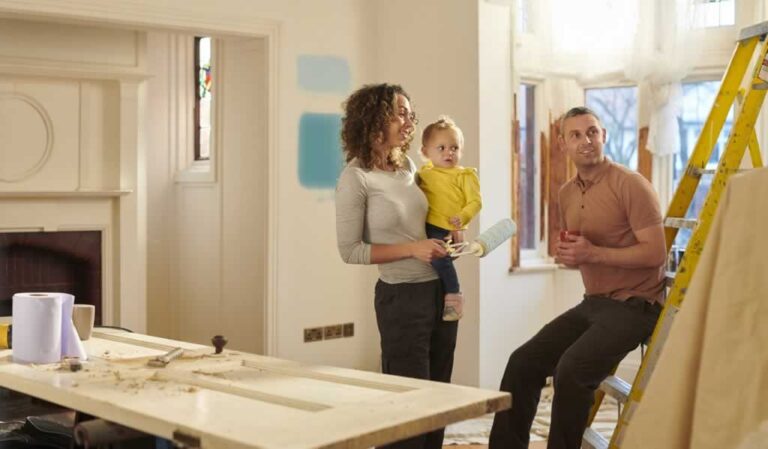 couple doing DIY home repairs