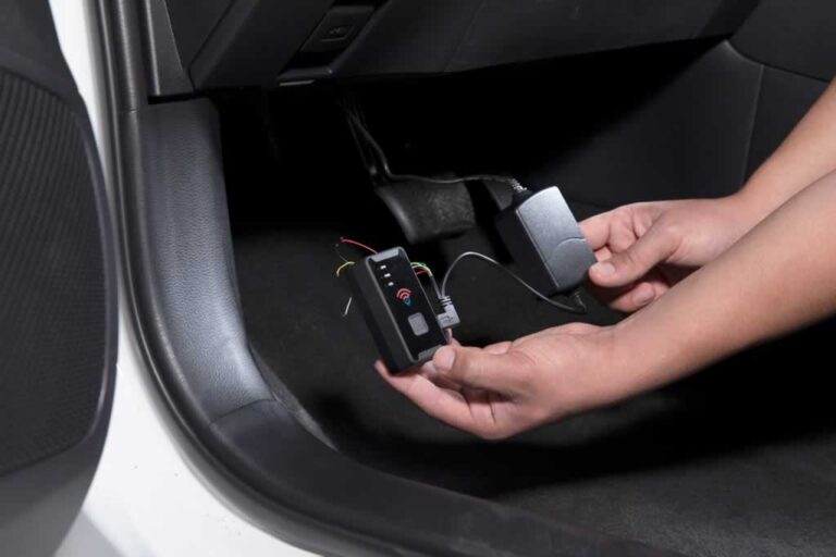 gps tracker installed under the wheel in the car