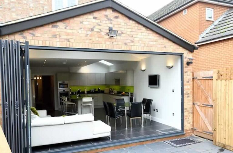 garage conversion to living room with sliding door