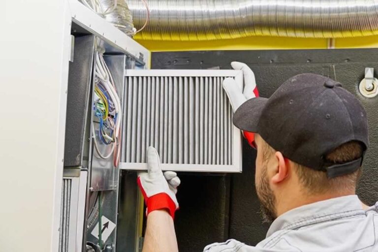 changing air filter in commercial air conditioner