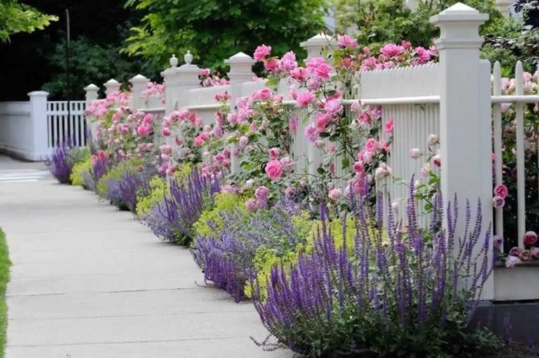perfect vinyl fence with flowers in front