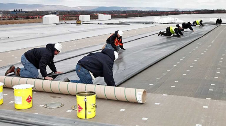 commercial roofers sealing flat roof