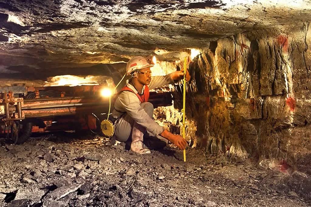 mining consultant measuring shaft height