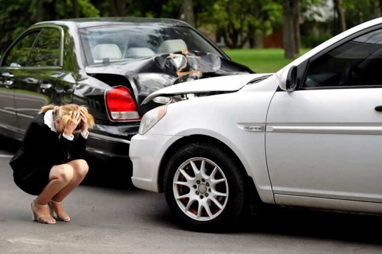 women in despair after car accident