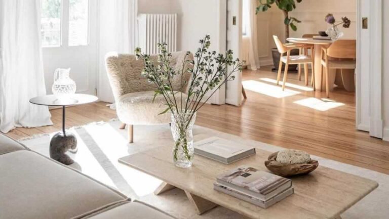 living room decor with lots of light an fresh flowers on the table