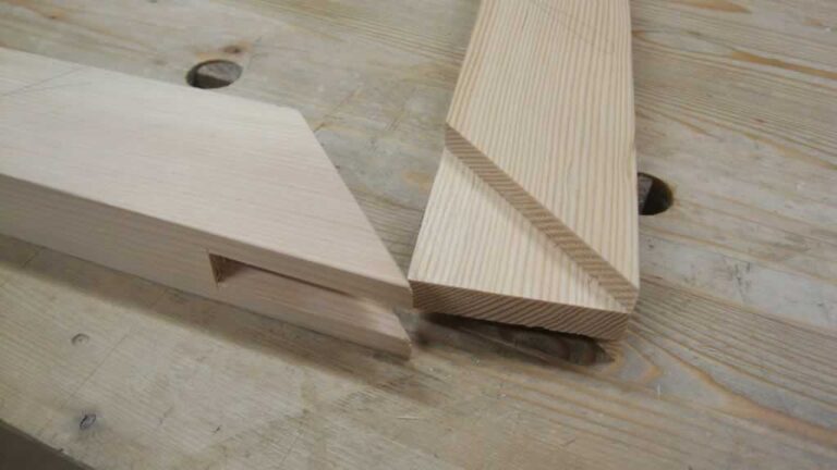 two pieces of wood with mortise an tenon bridle joint