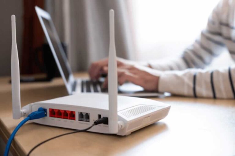 laptop and router on the table