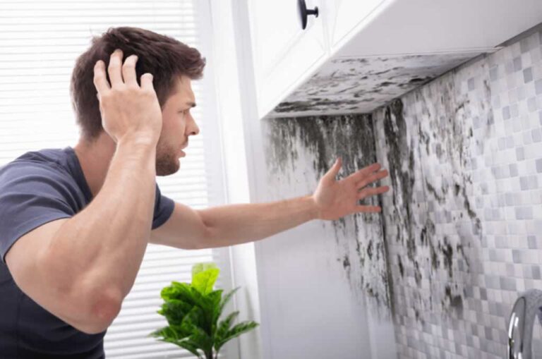 man panicking about the mold in the kitchen